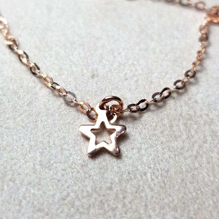 18k red gold bracelet with stars hearts and flowers