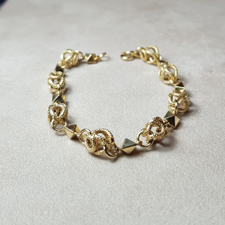 18k yellow gold elaborated elements bracelet